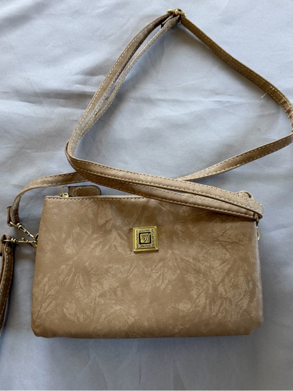 Stone Mountain Beige-Tan Crossbody Bag with Gold Emblem